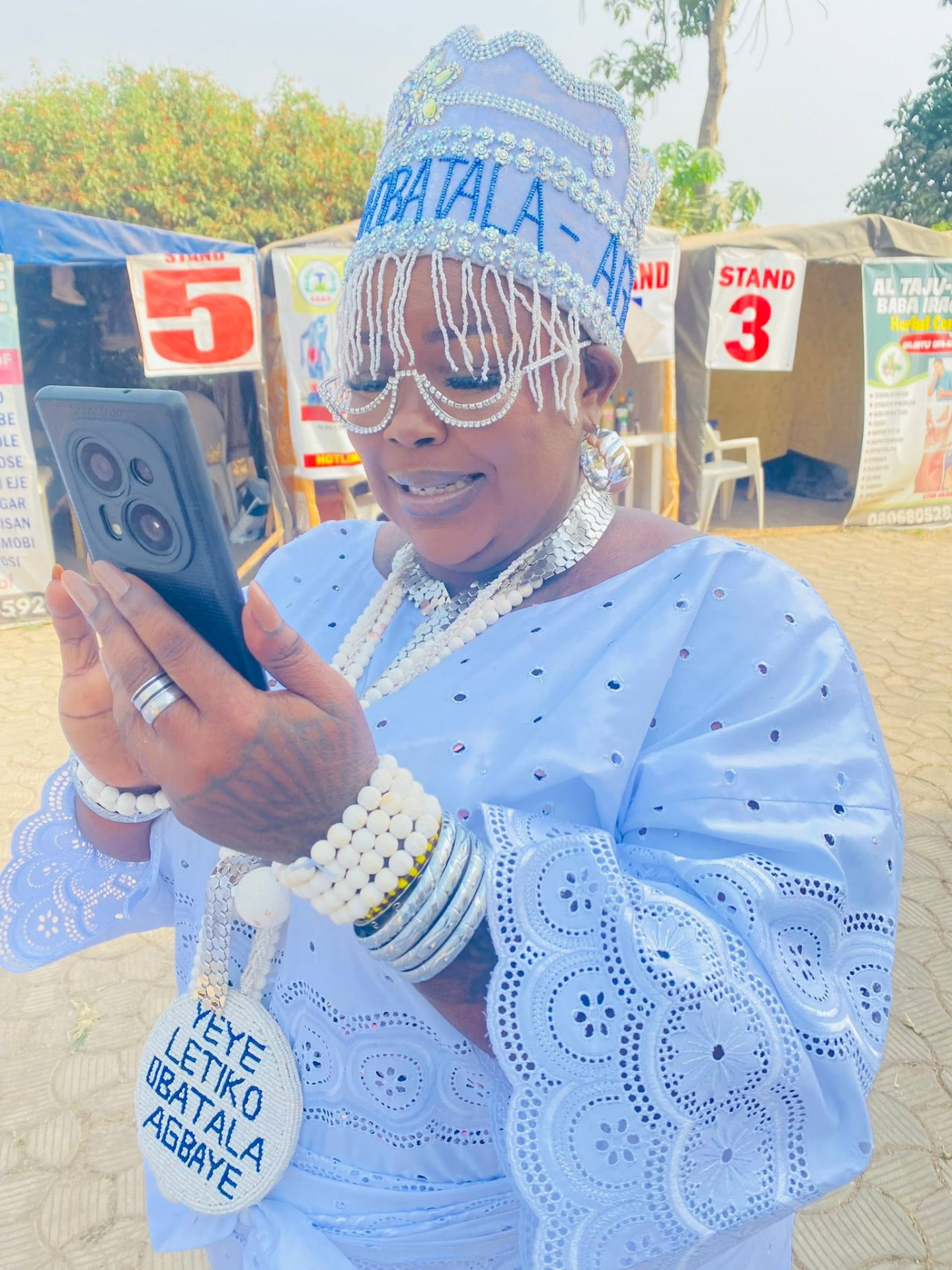 A Queen devotee of Obàtálá in ceremonial attire